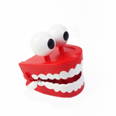 Заводная игрушка для развлечений "Зубы с глазами"